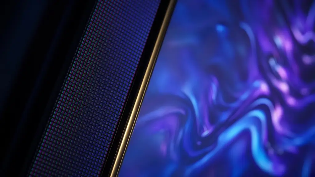 Macro close-up of a high-resolution TV panel showing its fine pixel grid